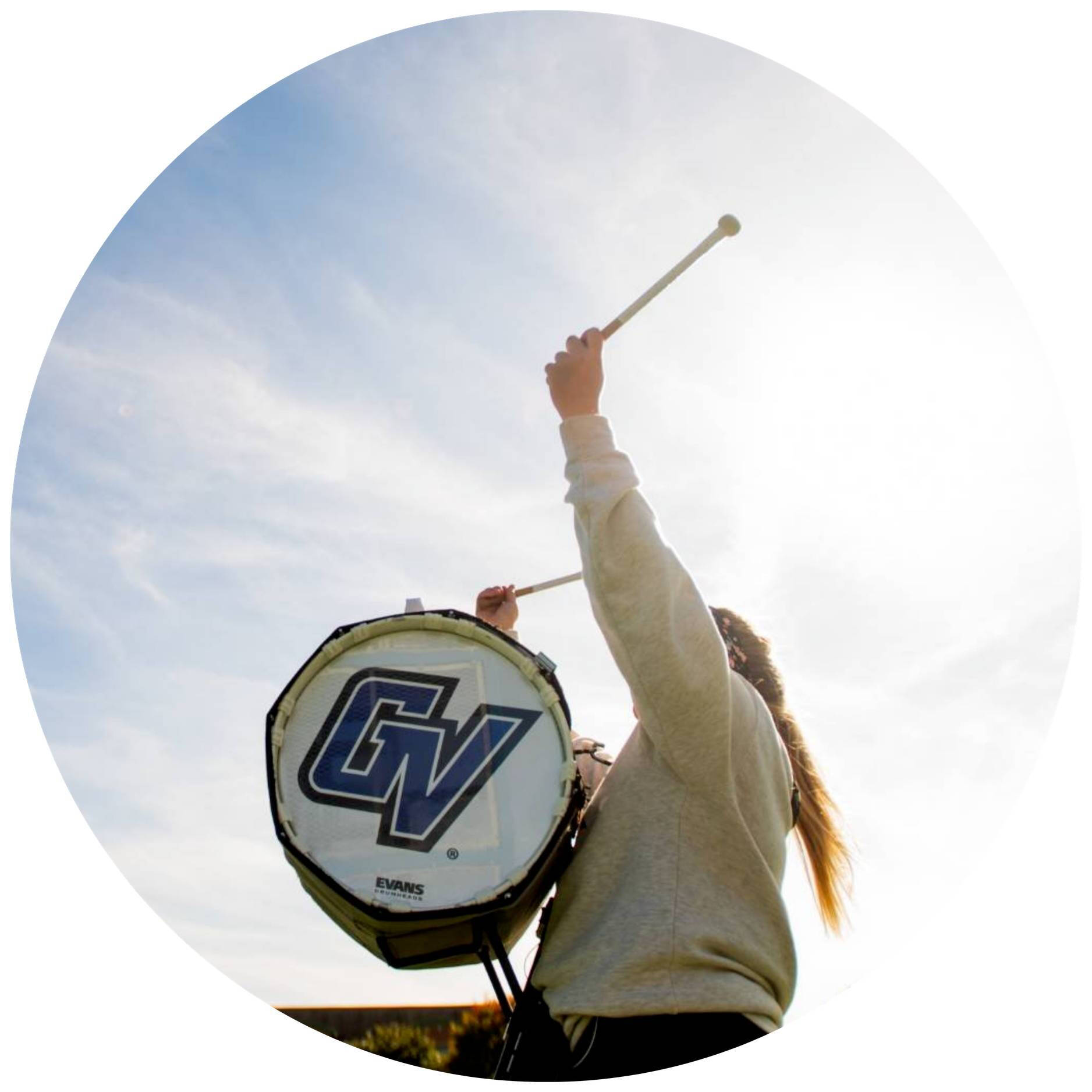 Student playing bass drum